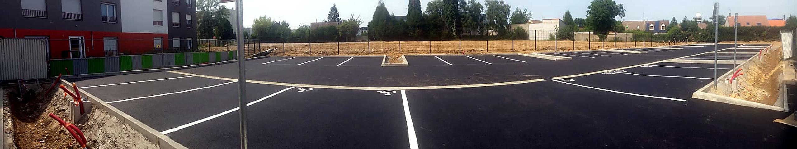 Parking aménagé — Adoma